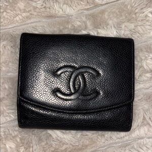 Chanel compact bifold wallet crafted from black caviar leather